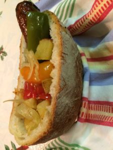 Sausage and potatoes and peppers sandwich