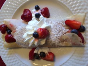 Crepes stuffed with Berries and Custard